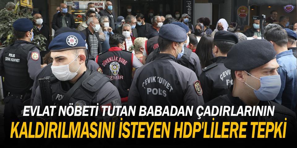 İzmir'de terör örgütü PKK tarafından evlatları dağa kaçırılan ailelerin HDP il binası önünde nöbet tuttuğu çadırın kaldırılması için açıklama yapan partililere evlat nöbetindeki Mehmet Laçin tepki gösterdi. ( Mustafa Güngör - Anadolu Ajansı )